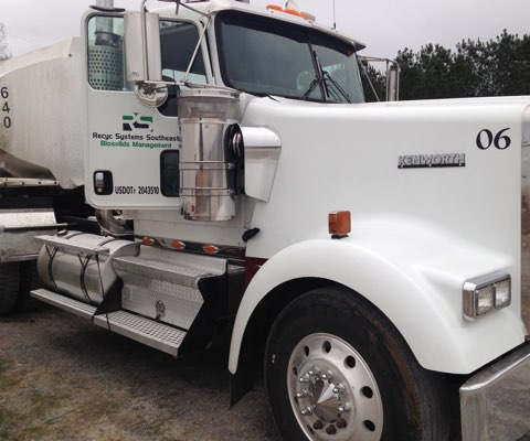 white truck cab with logo