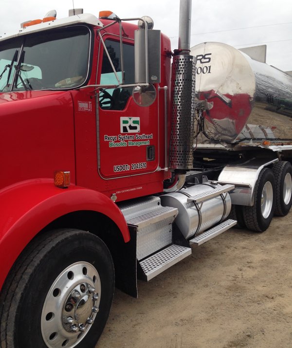 red tanker truck with logo